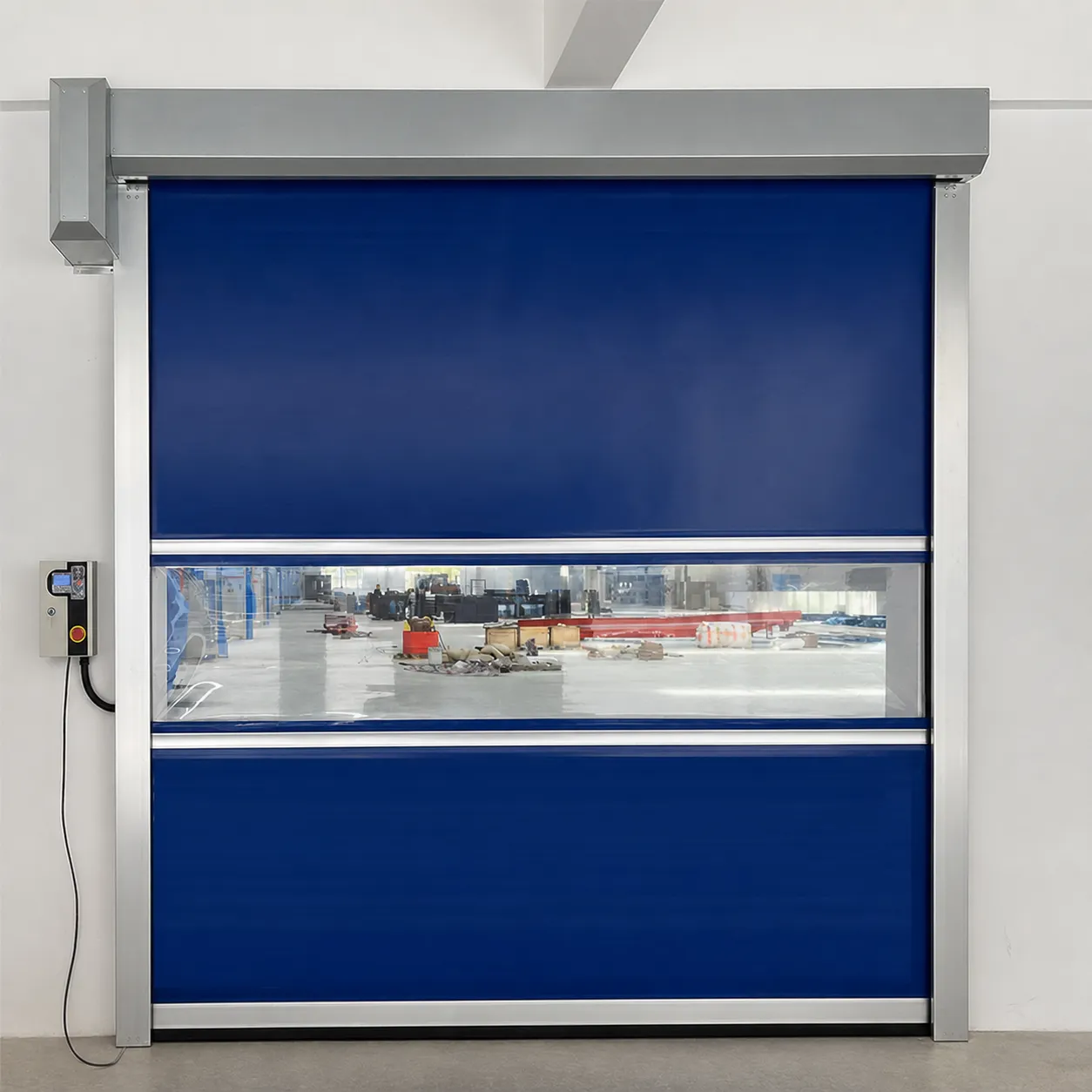 Blue PVC high speed door with a clear vision strip and a control box on the wall