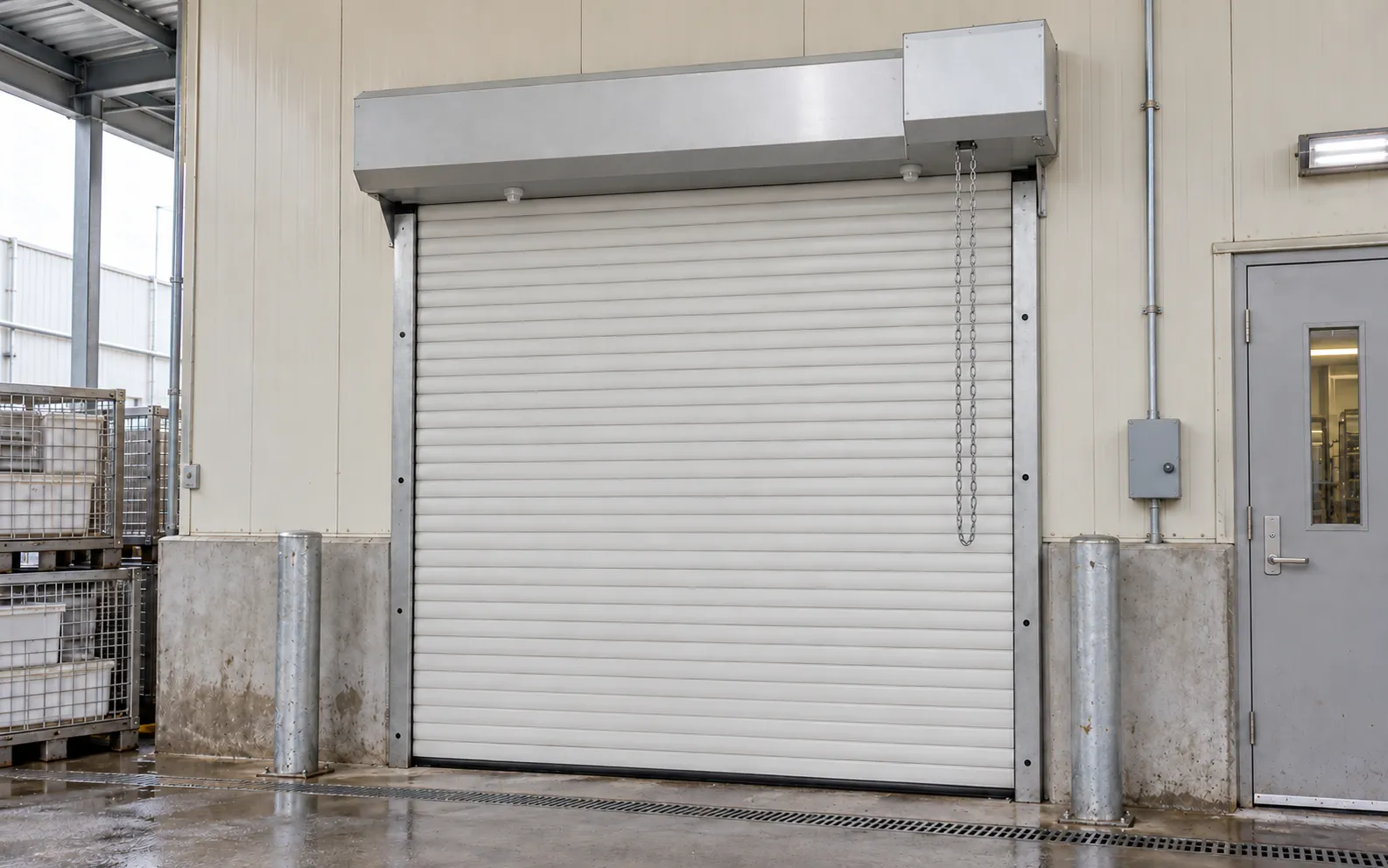 White prepainted steel roller shutter in a food factory (rendering)