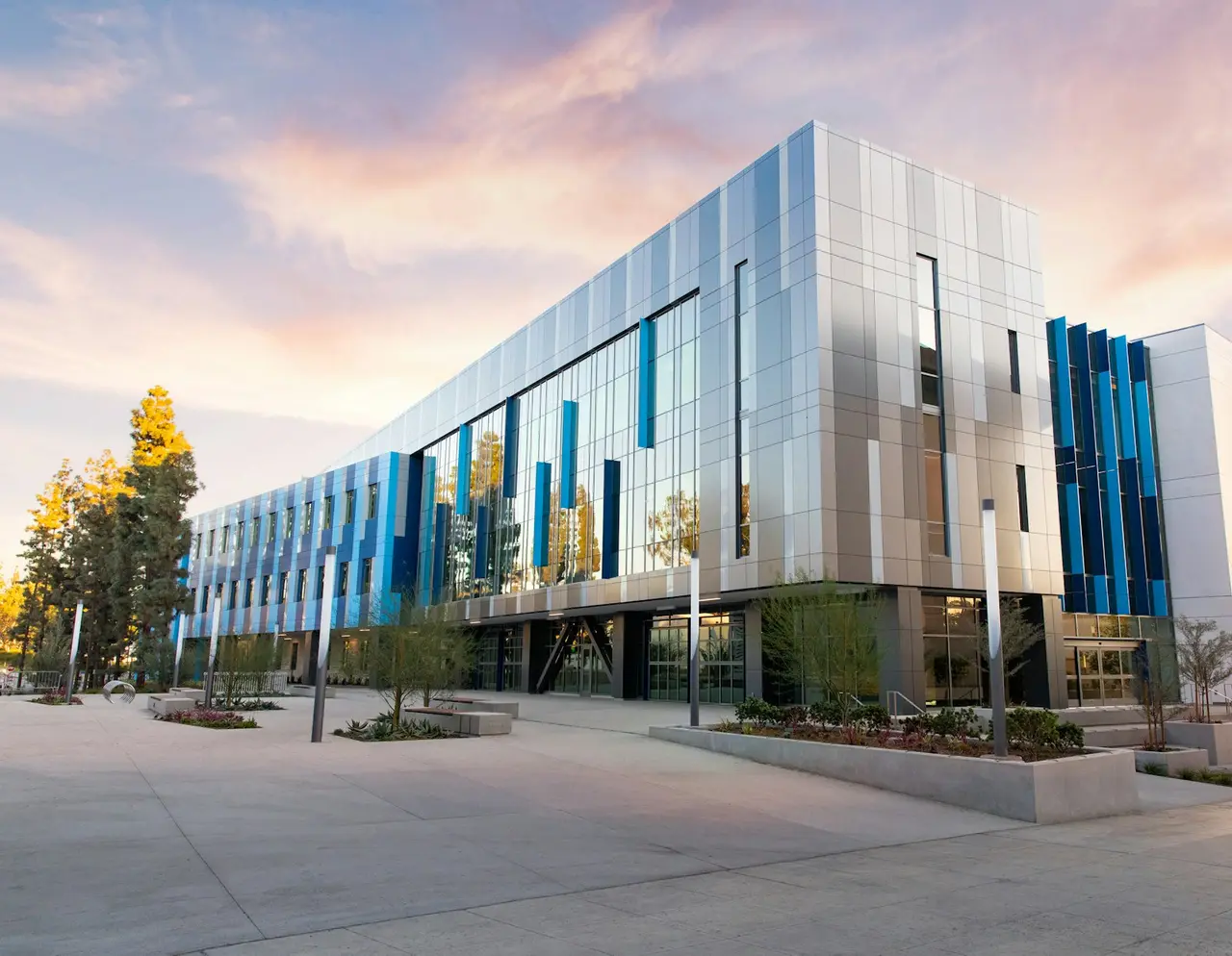 Modern office building with silver and blue façade panels